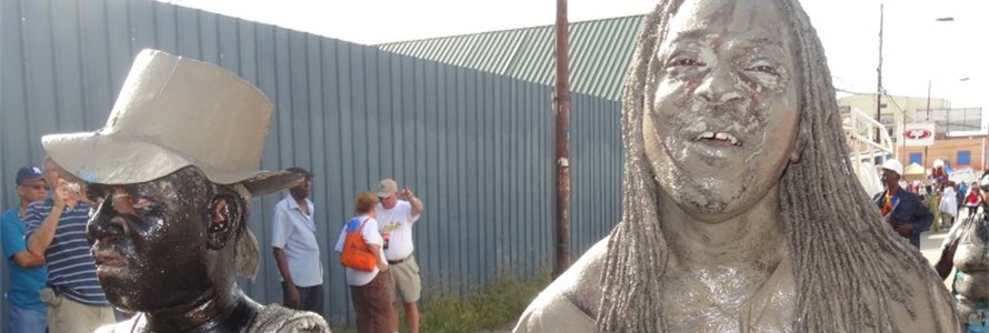 The marchers paint themselves with mud, oil and paint! 