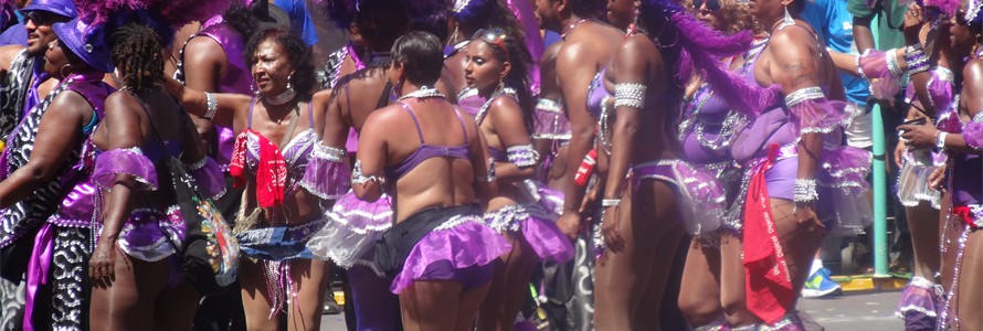 They march across the stage at the stadium.  This group is called Tribe.