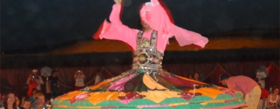 Whiriling Dervish.  In the Middle East the dance is as popular as belly dancing.