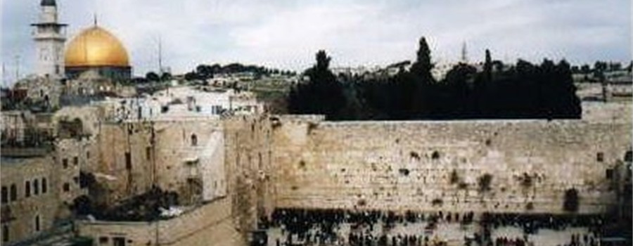 Jerusalem - The Wailing Wall with Dome of the Rock in the background.