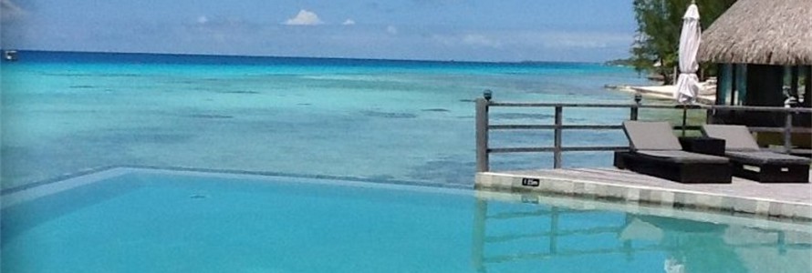 The infinity pool and lagoon at the Hotel Kia Ora Rangiroa in the Tuamotus.